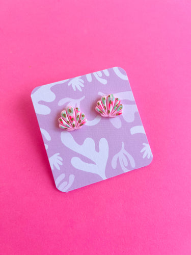 Pink painted shell studs